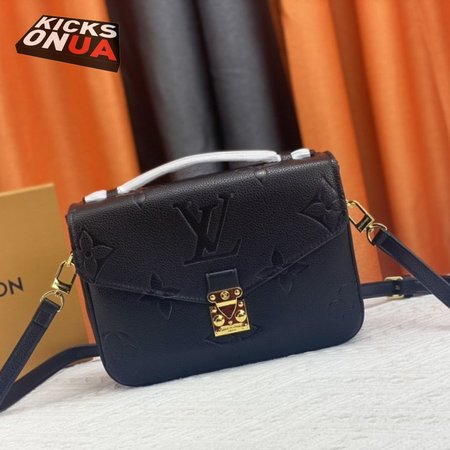 pochette metis black monogram empreinte leather with gold